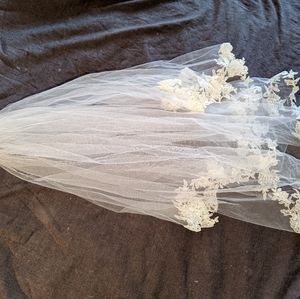 Two tier wedding veil with details.